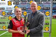 13 August 2023; Orla Duffy of Down receives the Player of the Match award from TG4 head of sport Ronan O Coisdealbha after the 2023 TG4 All-Ireland Ladies Junior Football Championship Final match between Down and Limerick at Croke Park in Dublin. Photo by Seb Daly/Sportsfile