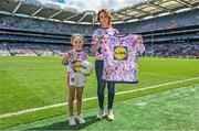 14 August 2023; Lidl Ireland Chief Executive Officer J.P. Scally presented seven-year-old Aoife Callanan with her winning design for the nationwide Ladies Gaelic Football Jersey Design Competition which challenged shoppers to create a bespoke jersey design to celebrate the 50th Anniversary of the Ladies Gaelic Football Association. The presentation took place at Croke Park during the All-Ireland Ladies’ Football Finals on Sunday 13th September. Aoife is from Ballinadee/Ballinspittle, Cork, and plays Ladies Gaelic Football for Courcey Rovers. Lidl will now produce 10,000 of her jersey design which shoppers will be able to access via the Lidl Plus LGFA Schools Rewards Scheme. Aoife and her family, who were Lidl’s guests at the All-Ireland Finals, also received €1,000 in Lidl vouchers for winning the competition. Photo by Seb Daly/Sportsfile