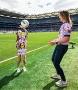 14 August 2023; Seven-year-old Aoife Callanan with her mother Claire Callanan at Croke Park after being presented with her winning design for the nationwide Ladies Gaelic Football Jersey Design Competition which challenged shoppers to create a bespoke jersey design to celebrate the 50th Anniversary of the Ladies Gaelic Football Association. The presentation took place at Croke Park during the All-Ireland Ladies’ Football Finals on Sunday 13th September. Aoife is from Ballinadee/Ballinspittle, County Cork and plays Ladies Gaelic Football for Courcey Rovers.  Lidl will now produce 10,000 of her jersey design which shoppers will be able to access via the Lidl Plus LGFA Rewards Scheme.    Aoife and her family, who were Lidl’s guests at the All-Ireland Finals, also received €1,000 in Lidl vouchers for winning the competition. Photo by Ramsey Cardy/Sportsfile