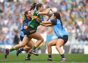 13 August 2023; Emma Costello of Kerry in action against Dublin players Martha Byrne, left, and Leah Caffrey during the 2023 TG4 LGFA All-Ireland Senior Championship Final match between Dublin and Kerry at Croke Park in Dublin. Photo by Seb Daly/Sportsfile