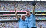 13 August 2023; Dublin manager Mick Bohan, right, and analyst Frankie Roebuck celebrate after their side's victory in the 2023 TG4 LGFA All-Ireland Senior Championship Final match between Dublin and Kerry at Croke Park in Dublin. Photo by Seb Daly/Sportsfile