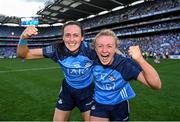 13 August 2023; Dublin captain Carla Rowe, right, celebrates with team-mate Hannah Tyrrell after their side's victory in the 2023 TG4 LGFA All-Ireland Senior Championship Final match between Dublin and Kerry at Croke Park in Dublin. Photo by Piaras Ó Mídheach/Sportsfile