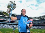 13 August 2023; Dublin's Hannah Tyrrell holds her seven week old daughter Aoife as she celebrates with the Brendan Martin Cup after her side's victory in the 2023 TG4 LGFA All-Ireland Senior Championship Final match between Dublin and Kerry at Croke Park in Dublin. Photo by Seb Daly/Sportsfile