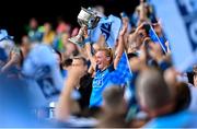 13 August 2023; Dublin captain Carla Rowe lifts the Brendan Martin Cup after the 2023 TG4 LGFA All-Ireland Senior Championship Final match between Dublin and Kerry at Croke Park in Dublin. Photo by Ramsey Cardy/Sportsfile