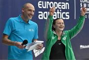 13 August 2023; Mona McSharry of Ireland, right, acknowledges supporters after winning the women's 200m breaststroke final during day three of the European U23 Swimming Championships at the National Aquatic Centre in Dublin. Photo by Tyler Miller/Sportsfile