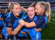 13 August 2023; Lauren Magee of Dublin, centre, celebrates with her team-mates Sinéad Wylde, left, and Caoimhe O'Connor after their side's victory in the 2023 TG4 LGFA All-Ireland Senior Championship Final match between Dublin and Kerry at Croke Park in Dublin. Photo by Piaras Ó Mídheach/Sportsfile