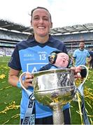 13 August 2023; Hannah Tyrrell of Dublin and her seven week old daughter Aoife celebrate with the Brendan Martin Cup after the 2023 TG4 LGFA All-Ireland Senior Championship Final match between Dublin and Kerry at Croke Park in Dublin. Photo by Seb Daly/Sportsfile