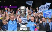 13 August 2023; Dublin captain Carla Rowe, left, and teammate Leah Caffrey lift the Brendan Martin Cup after their side's victory in the 2023 TG4 LGFA All-Ireland Senior Championship Final match between Dublin and Kerry at Croke Park in Dublin. Photo by Seb Daly/Sportsfile