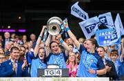 13 August 2023; Dublin players Sinéad Aherne, centre, and Orlagh Nolan, right, lift the Brendan Martin Cup after the 2023 TG4 LGFA All-Ireland Senior Championship Final match between Dublin and Kerry at Croke Park in Dublin. Photo by Seb Daly/Sportsfile