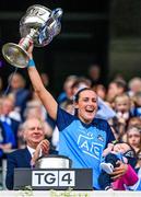 13 August 2023; Hannah Tyrrell of Dublin holds her seven week old daughter Aoife as she lifts the Brendan Martin Cup after the 2023 TG4 LGFA All-Ireland Senior Championship Final match between Dublin and Kerry at Croke Park in Dublin. Photo by Seb Daly/Sportsfile