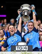 13 August 2023; Dublin players Aoife Kane, left, and Lauren Magee lift the Brendan Martin Cup after the 2023 TG4 LGFA All-Ireland Senior Championship Final match between Dublin and Kerry at Croke Park in Dublin. Photo by Seb Daly/Sportsfile