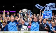 13 August 2023; Dublin players Jodi Egan, left, and Kate Sullivan lift the Brendan Martin Cup after the 2023 TG4 LGFA All-Ireland Senior Championship Final match between Dublin and Kerry at Croke Park in Dublin. Photo by Seb Daly/Sportsfile