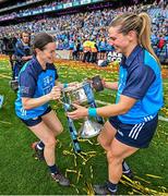 13 August 2023; Dublin players Sinéad Aherne, left, and Martha Byrne celebrates with the Brendan Martin Cup after the 2023 TG4 LGFA All-Ireland Senior Championship Final match between Dublin and Kerry at Croke Park in Dublin. Photo by Seb Daly/Sportsfile