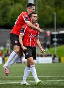 13 August 2023; Jordan McEneff, left, celebrates with Derry City team-mate Michael Duffy after scoring their first goal during the SSE Airtricity Men's Premier Division match between Derry City and Drogheda United at The Ryan McBride Brandywell Stadium in Derry. Photo by Stephen McCarthy/Sportsfile