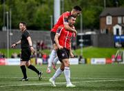 13 August 2023; Jordan McEneff, top, celebrates with Derry City team-mate Michael Duffy after scoring their first goal during the SSE Airtricity Men's Premier Division match between Derry City and Drogheda United at The Ryan McBride Brandywell Stadium in Derry. Photo by Stephen McCarthy/Sportsfile