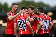 13 August 2023; Jordan McEneff, 22, of Derry City celebrates with team-mates, from left, Shane McEleney, Cameron McJannet and Michael Duffy after scoring his side's first goal during the SSE Airtricity Men's Premier Division match between Derry City and Drogheda United at The Ryan McBride Brandywell Stadium in Derry. Photo by Stephen McCarthy/Sportsfile