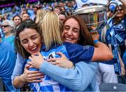 13 August 2023; Dublin captain Carla Rowe celebrates with her former team-mates Lyndsey Davey, left, and Siobhán McGrath after the 2023 TG4 LGFA All-Ireland Senior Championship Final match between Dublin and Kerry at Croke Park in Dublin. Photo by Piaras Ó Mídheach/Sportsfile