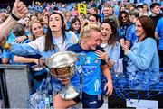 13 August 2023; Dublin captain Carla Rowe celebrates with her former team-mates, from left, Sinéad Finnegan, Niamh McEvoy, Lyndsey Davey and Siobhán McGrath after the 2023 TG4 LGFA All-Ireland Senior Championship Final match between Dublin and Kerry at Croke Park in Dublin. Photo by Piaras Ó Mídheach/Sportsfile