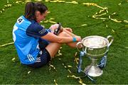 13 August 2023; Player of the match Hannah Tyrrell of Dublin celebrates with her daughter Aoife, age 7 weeks, alongside the Brendan Martin Cup after victory in the 2023 TG4 LGFA All-Ireland Senior Championship Final match between Dublin and Kerry at Croke Park in Dublin. Photo by Piaras Ó Mídheach/Sportsfile