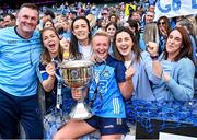 13 August 2023; Dublin captain Carla Rowe and team manager Mick Bohan celebrate with former team-mates, from left, Sinéad Finnegan, Niamh McEvoy, Lyndsey Davey and Siobhán McGrath after the 2023 TG4 LGFA All-Ireland Senior Championship Final match between Dublin and Kerry at Croke Park in Dublin. Photo by Piaras Ó Mídheach/Sportsfile