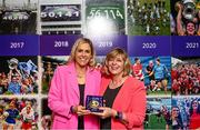 13 August 2023; 2008 Cork All-Ireland winning captain Angela Walsh is presented with a medallion by former LGFA President Marie Hickey during a special luncheon before the TG4 LGFA All-Ireland Senior Championship Final at Croke Park in Dublin. Photo by Ramsey Cardy/Sportsfile