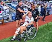 13 August 2023; Lauren Burke of Kildare, who was substituted due to injury earlier in the match, celebrates with team-mates after victory the 2023 TG4 All-Ireland Ladies Intermediate Football Championship Final match between Clare and Kildare at Croke Park in Dublin. Photo by Piaras Ó Mídheach/Sportsfile
