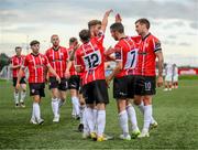 13 August 2023; Michael Duffy, 7, is congratulated by Derry City team-mates after scoring their third goal during the SSE Airtricity Men's Premier Division match between Derry City and Drogheda United at The Ryan McBride Brandywell Stadium in Derry. Photo by Stephen McCarthy/Sportsfile