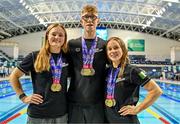 13 August 2023; Ireland athletes, left, Mona McSharry, Daniel Wiffen and Ellen Walshe pose for a portrait with their medals during day three of the European U23 Swimming Championships at the National Aquatic Centre in Dublin. Photo by Tyler Miller/Sportsfile
