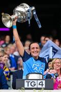 13 August 2023; Hannah Tyrrell of Dublin holds her seven week old daughter Aoife as she lifts the Brendan Martin Cup after the 2023 TG4 LGFA All-Ireland Senior Championship Final match between Dublin and Kerry at Croke Park in Dublin. Photo by Seb Daly/Sportsfile