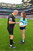 13 August 2023; Referee Shane Curley is presented with the match ball by Máire-Eilís Nic Gearailt of Corca Dhuibhne, Kerry, before the 2023 TG4 LGFA All-Ireland Senior Championship Final match between Dublin and Kerry at Croke Park in Dublin. Photo by Seb Daly/Sportsfile