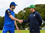 14 Augut 2023; Leinster Lightning captain George Dockrell, left, and North West Warriors captain Andy McBrine shake hand after the coin toss before the Rario Inter-Provincial Cup match between Leinster Lightning and North West Warriors at The Hills Cricket Club in Dublin. Photo by Tyler Miller/Sportsfile