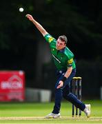 14 Augut 2023; Ryan Macbeth of North West Warriors bowls during the Rario Inter-Provincial Cup match between Leinster Lightning and North West Warriors at The Hills Cricket Club in Dublin. Photo by Tyler Miller/Sportsfile