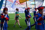 13 August 2023; Kerry captain Louise Ní Mhuircheartaigh leads her team-mates in the parade behind the Artane Band before the 2023 TG4 LGFA All-Ireland Senior Championship Final match between Dublin and Kerry at Croke Park in Dublin. Photo by Piaras Ó Mídheach/Sportsfile