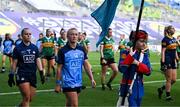 13 August 2023; Dublin captain Carla Rowe leads her team-mates in the parade behind the Artane Band before the 2023 TG4 LGFA All-Ireland Senior Championship Final match between Dublin and Kerry at Croke Park in Dublin. Photo by Piaras Ó Mídheach/Sportsfile