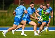 14 August 2023; Ben Brownlee, centre, and John McKee, right, during Leinster rugby squad training at UCD in Dublin. Photo by David Fitzgerald/Sportsfile