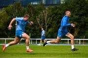 14 August 2023; Sam Prendergast, right, and John McKee during Leinster rugby squad training at UCD in Dublin. Photo by David Fitzgerald/Sportsfile