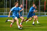 14 August 2023; From left, Henry McErlean, John McKee, Sam Prendergast and Jordan Larmour during Leinster rugby squad training at UCD in Dublin. Photo by David Fitzgerald/Sportsfile