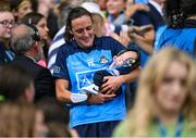 13 August 2023; Player of the match Hannah Tyrrell of Dublin celebrates with her daughter Aoife, age 7 weeks, after victory in the 2023 TG4 LGFA All-Ireland Senior Championship Final match between Dublin and Kerry at Croke Park in Dublin. Photo by Piaras Ó Mídheach/Sportsfile