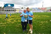 13 August 2023; Dublin backroom team members Frankie Roebuck, left, and Shane Kearney with the Brendan Martin Cup after their side's victory in the 2023 TG4 LGFA All-Ireland Senior Championship Final match between Dublin and Kerry at Croke Park in Dublin. Photo by Piaras Ó Mídheach/Sportsfile