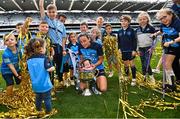 13 August 2023; Player of the match Hannah Tyrrell of Dublin celebrates with her daughter Aoife, age 7 weeks, and supporters after victory in the 2023 TG4 LGFA All-Ireland Senior Championship Final match between Dublin and Kerry at Croke Park in Dublin. Photo by Piaras Ó Mídheach/Sportsfile