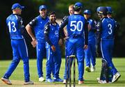 14 Augut 2023; Simi Singh of Leinster Lightning, third from left, celebrates with teammates after stumping out Cameron Melly of North West Warriors during the Rario Inter-Provincial Cup match between Leinster Lightning and North West Warriors at The Hills Cricket Club in Dublin. Photo by Tyler Miller/Sportsfile