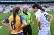 13 August 2023; Referee Gus Chapman with team captains Caoimhe Harvey of Clare and Grace Clifford of Kildare before the 2023 TG4 All-Ireland Ladies Intermediate Football Championship Final match between Clare and Kildare at Croke Park in Dublin. Photo by Piaras Ó Mídheach/Sportsfile