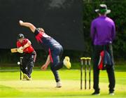 15 August 2023; Mark Adair of Northern Knights delivers to Ali Frost of Munster Reds during the Rario Inter-Provincial Cup match between Munster Reds and Northern Knights at The Mardyke in Cork. Photo by Eóin Noonan/Sportsfile