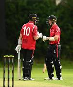 15 August 2023; PJ Moore, left, and Ali Frost of Munster Reds during the Rario Inter-Provincial Cup match between Munster Reds and Northern Knights at The Mardyke in Cork. Photo by Eóin Noonan/Sportsfile