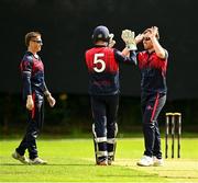 15 August 2023; Theo Van Woerkom of Northern Knights celebrates with team-mates after bowling out Murray Commins of Munster Reds during the Rario Inter-Provincial Cup match between Munster Reds and Northern Knights at The Mardyke in Cork. Photo by Eóin Noonan/Sportsfile