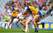 13 August 2023; Lara Curran of Kildare in action against Grainne Harvey of Clare during the 2023 TG4 All-Ireland Ladies Intermediate Football Championship Final match between Clare and Kildare at Croke Park in Dublin. Photo by Seb Daly/Sportsfile