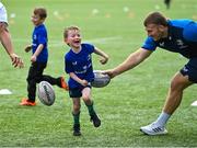 16 August 2023; Leinster player John McKee with Robin Redmond during the Bank of Ireland Leinster rugby summer camp at Energia Park in Dublin. Photo by Piaras Ó Mídheach/Sportsfile