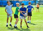 16 August 2023; Conor Walsh in possession during the Bank of Ireland Leinster rugby summer camp at Energia Park in Dublin. Photo by Piaras Ó Mídheach/Sportsfile