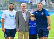 16 August 2023; Leinster players Charlie Ngatai, left, and John McKee alongside John Power, and his grandson Liam Power, during the Bank of Ireland Leinster rugby summer camp at Energia Park in Dublin. Photo by Piaras Ó Mídheach/Sportsfile