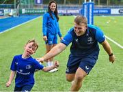 16 August 2023; Leinster player John McKee with Harris Adam during the Bank of Ireland Leinster rugby summer camp at Energia Park in Dublin. Photo by Piaras Ó Mídheach/Sportsfile